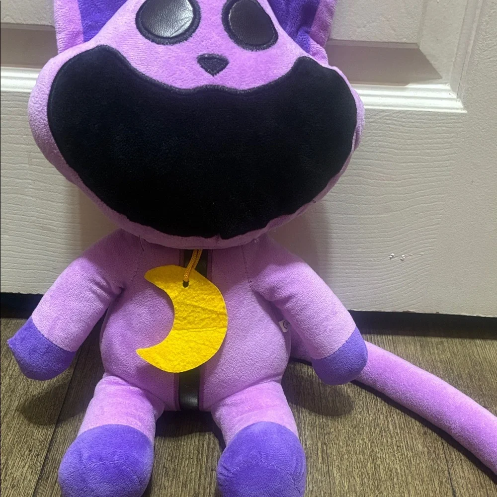 Purple Cat Plush Toy with Black Accents